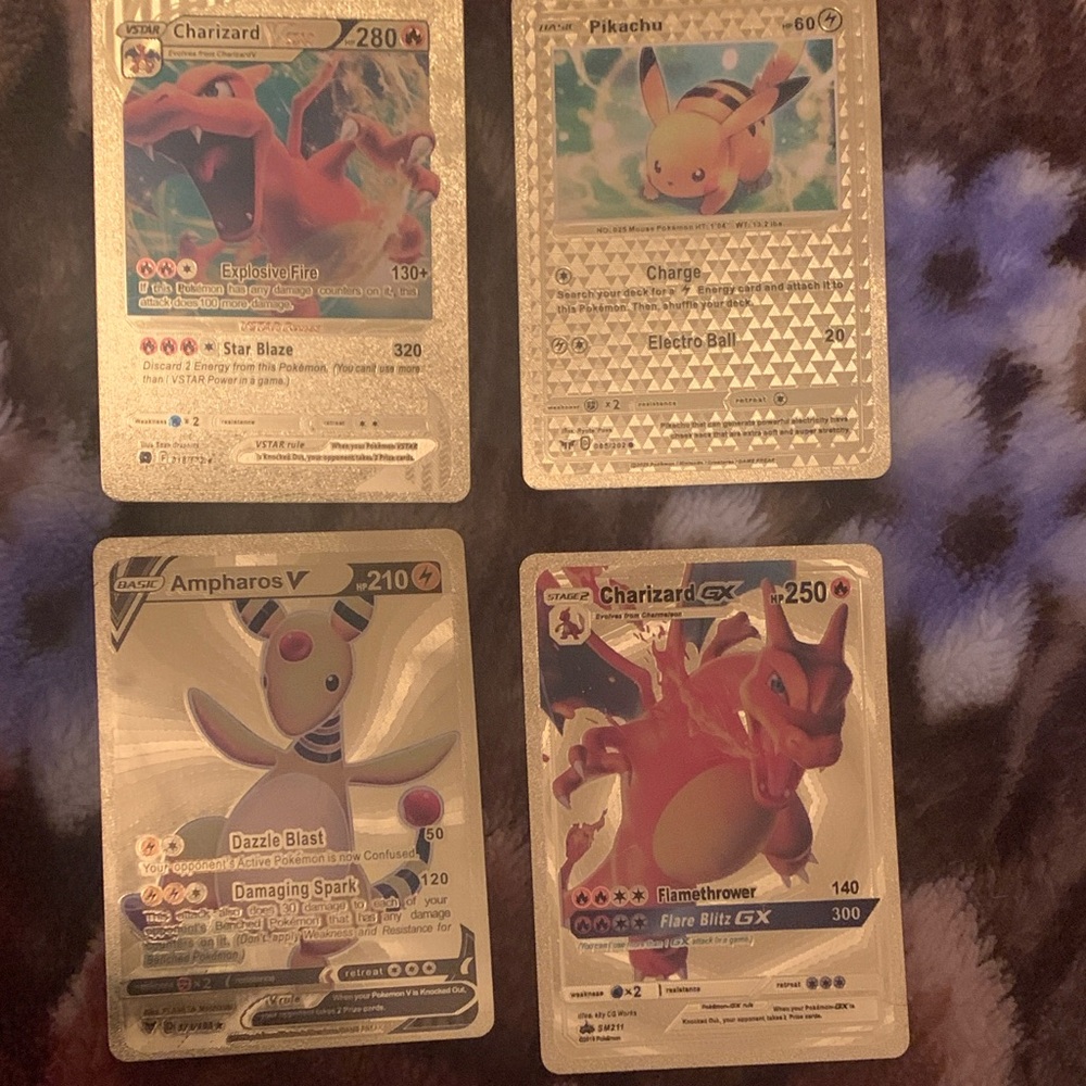 4 Pokemon Charizard and Pikachu Trading card